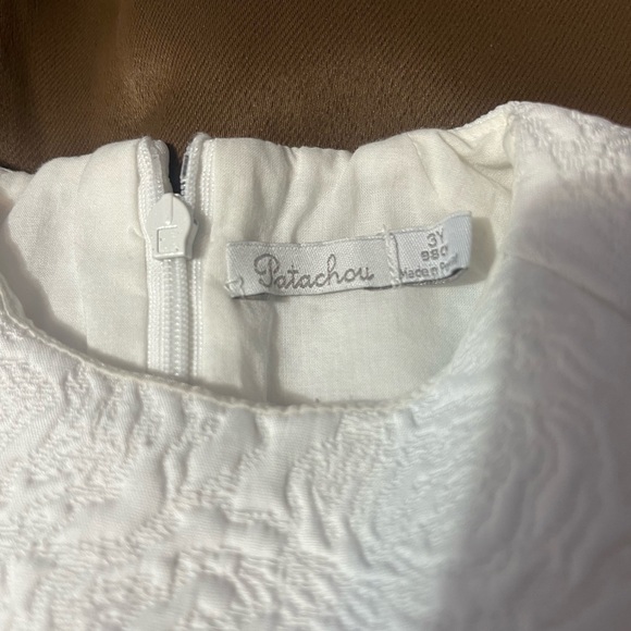 Charming White Textured Kids Dress - Picture 5 of 9